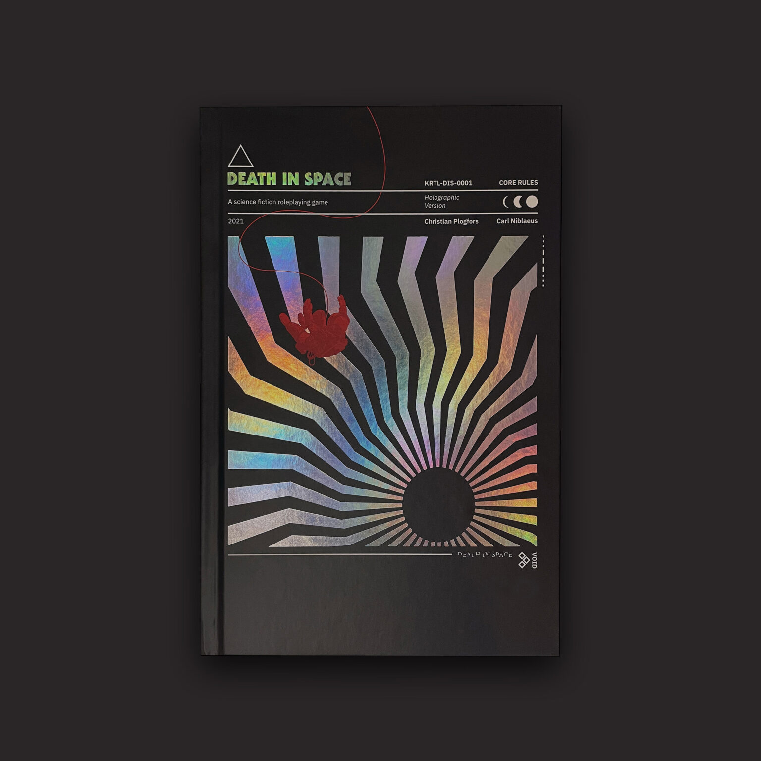 Book titled 'Death in Space' with a colorful abstract design on a dark background