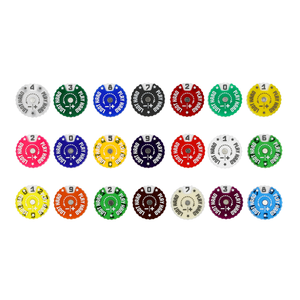 Set of colorful poker chips arranged in a grid on a white background