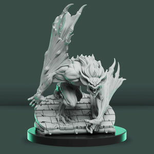 Gray dragon-like creature figurine on a dark green background