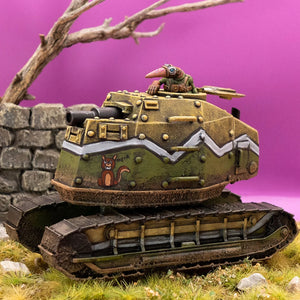 Model tank with a character on top against a purple background