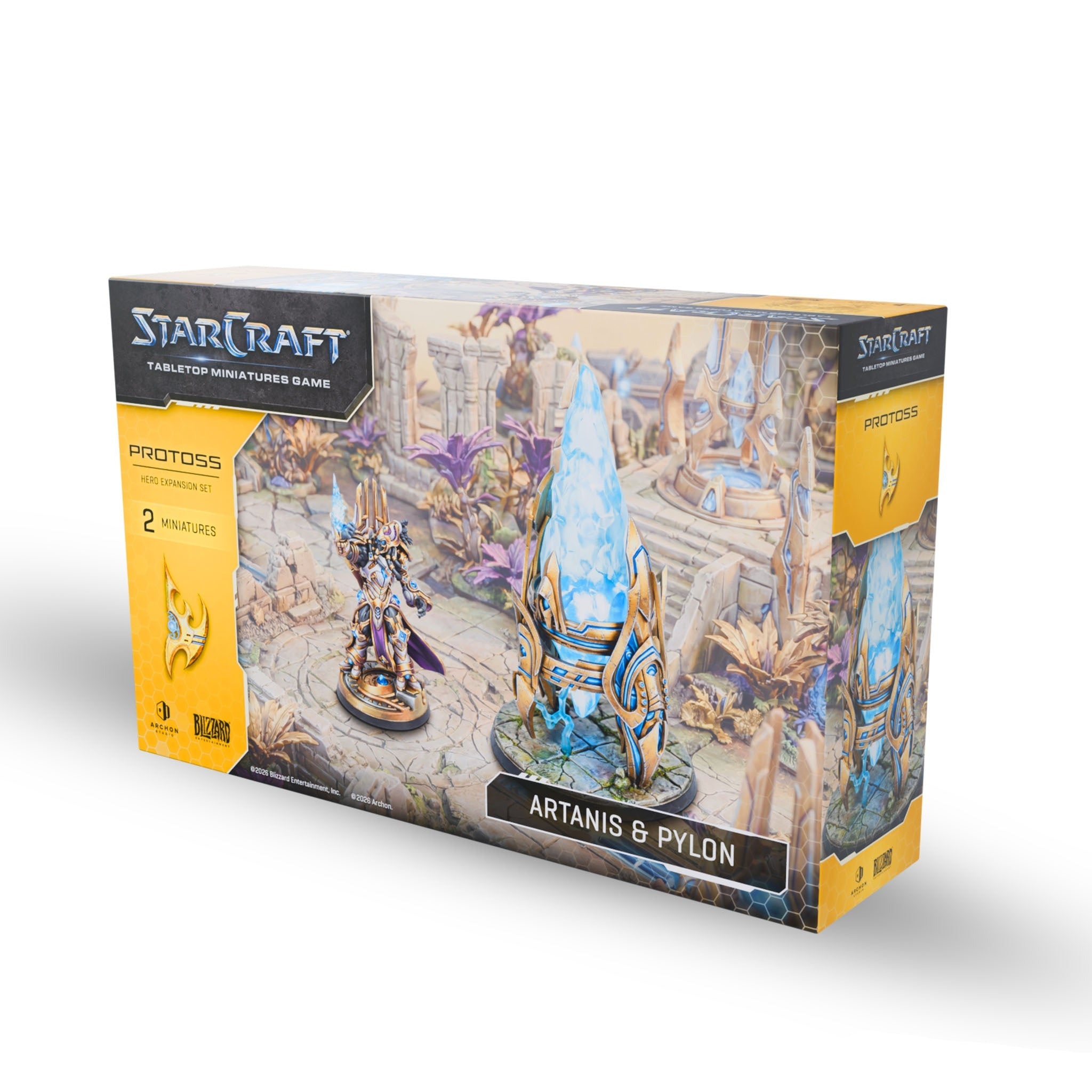 StarCraft tabletop miniature game box with Artanis and Pylon figures on a white background
