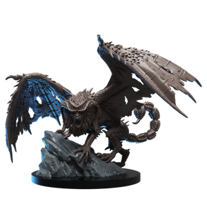 Dragon-like creature figurine on a rocky base with blue accents