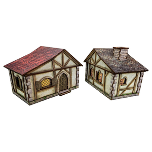 Two miniature model houses with different roof colors on a white background