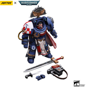 Toy figure of a warrior in blue armor with a sword and accessories, branded with JOYTOY and Warhammer.