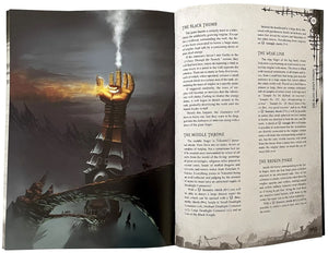 Open book with a fantasy illustration of a golden hand and text on the right page.